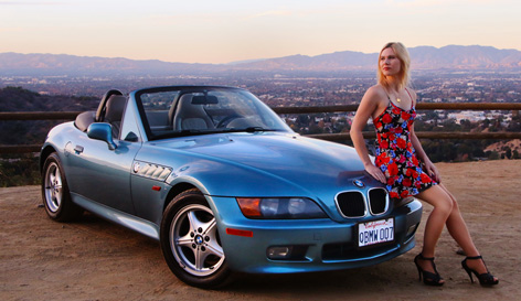 Athena Stamos and her BMW Z3 with James Bond 007 licence plate