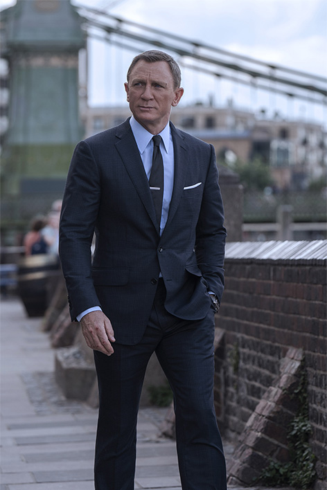 James Bond in TOM FORD Dark Blue Wool Silk Check O’Connor Notch Lapel Jacket, O’Connor Tailored Trousers, Sky Blue Poplin Collared Shirt and Dark Blue Diagonal Silk Tie