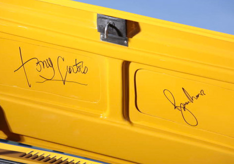 Aston Martin DBS autographs Roger Moore Tony Curtis