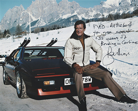 Roger Moore signed photo Lotus Esprit Cortina