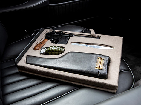 Aston Martin DB5 Goldfinger Thunderball auction RM Sothebys gadgets knife rifle