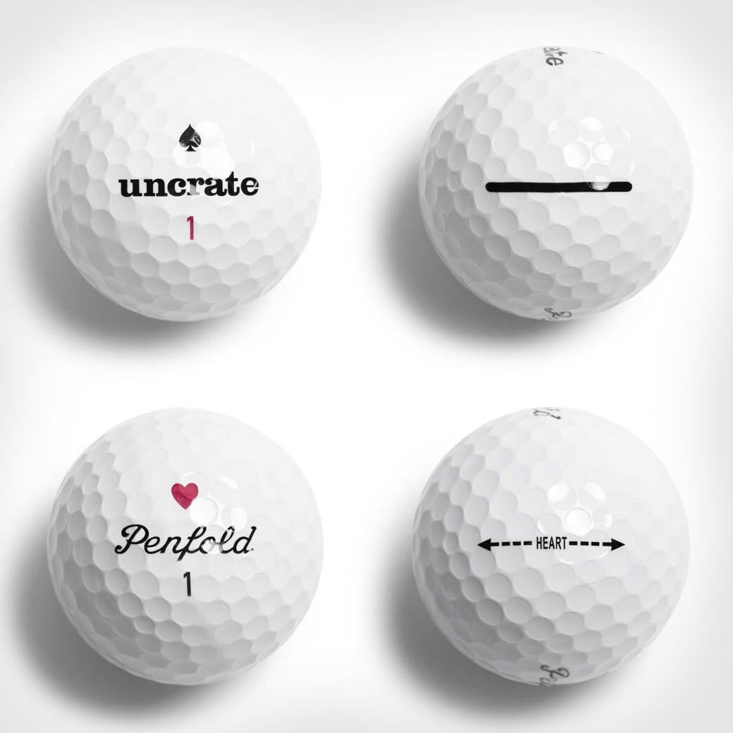 Penfold x Uncrate golf balls heart spade