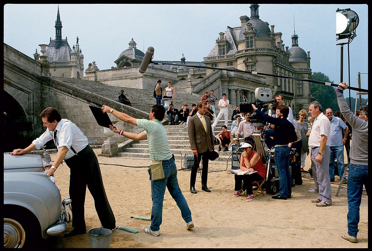 Roger Moore filming A View To A Kill at Chateau Chantilly, France