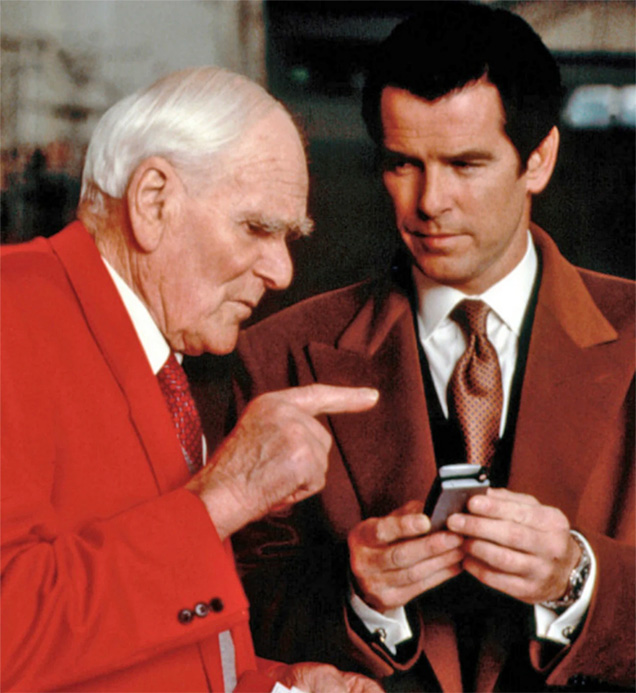 photo via Thunderballs.org © Danjaq LLC, MGM, United Pictures Pierce Brosnan as James Bod wearing the Turnbull & Asser shirt in Hamburg when meeting with Q at the airport.
