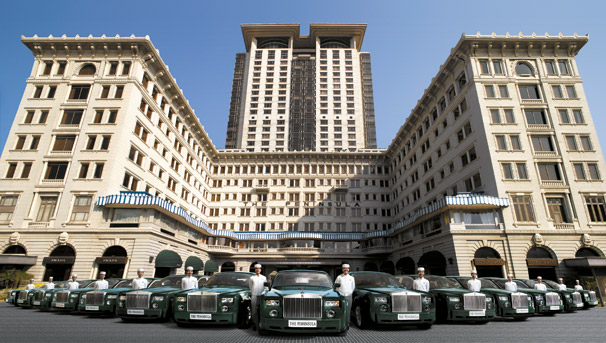 photo © The Peninsula The Peninsula Hong Kong with its fleet of green Rolls Royces. The central tower didn't exist yet at the time of the movie The Man With The Golden Gun (1974).