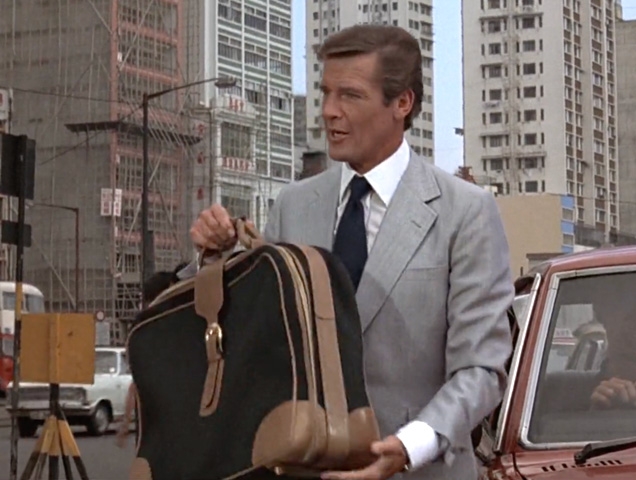 James Bond (Roger Moore) carries a Gucci suitcase in the 1974 movie The Man With The Golden Gun.