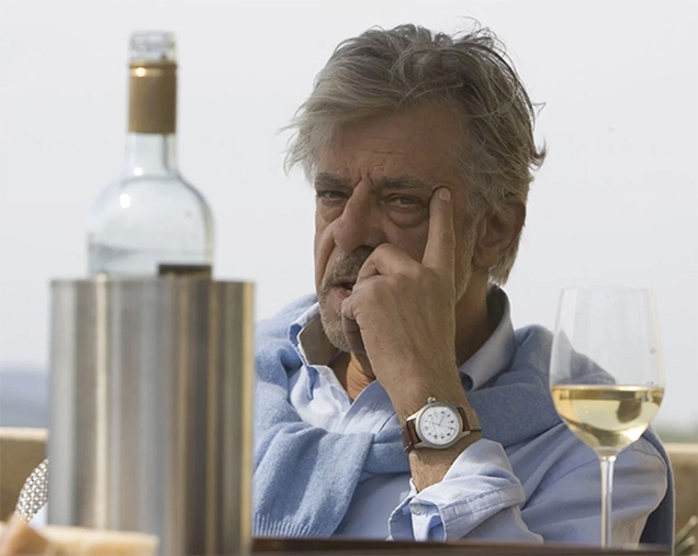 Giancarlo Giannini as René Mathis wearing a Hamilton Khaki Field watch in the movie Quantum of Solace.