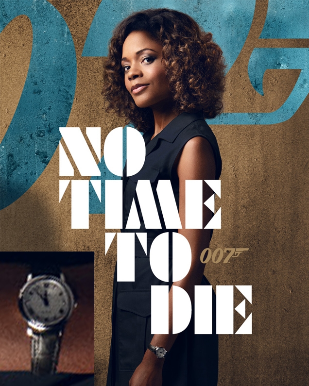 Eve Moneypenny (Naomie Harris) sports an Omega De Ville Prestige watch in the movie No Time To Die, seen her on the Moneypenny character poster.