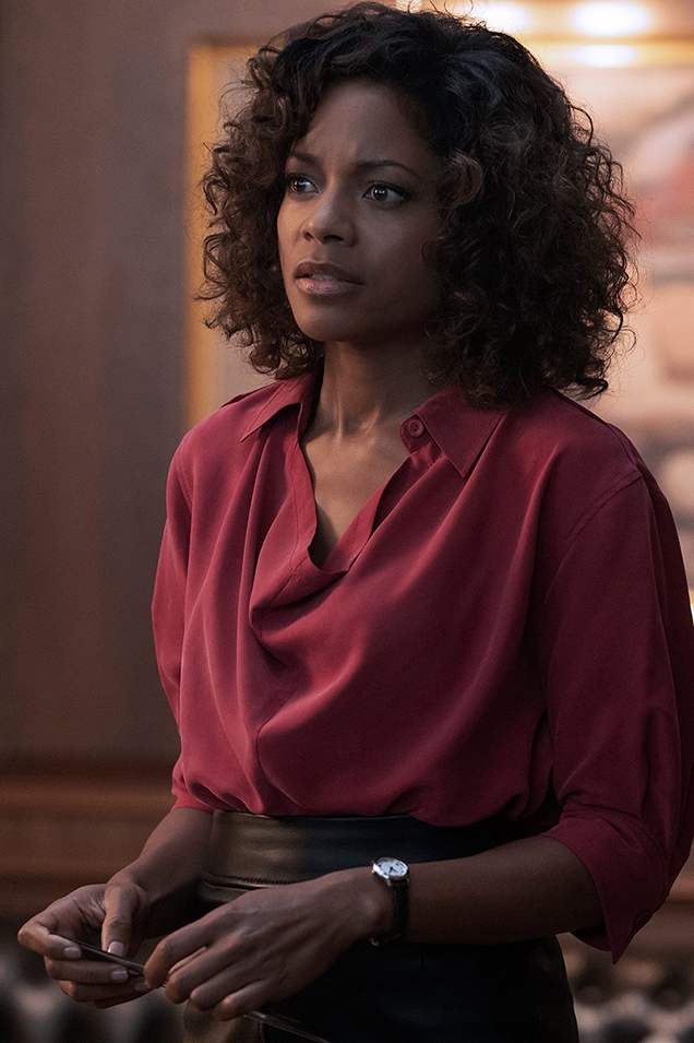 Eve Moneypenny (Naomie Harris) wears a Joseph Murry Fuji silk blouse in No Time To Die