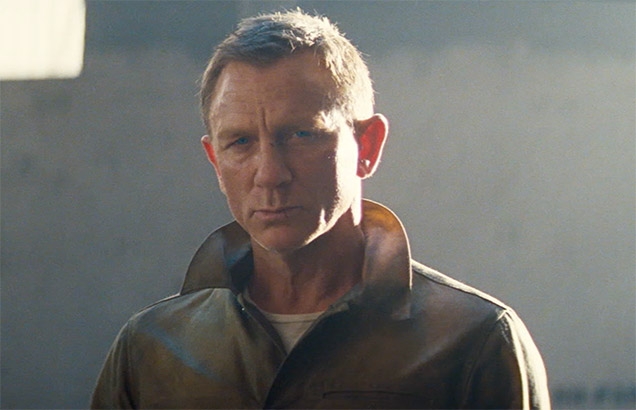 Daniel Craig as James Bond, wearing Rogue Territory Waxed Ridgeline Supply Jacket in No Time To Die
