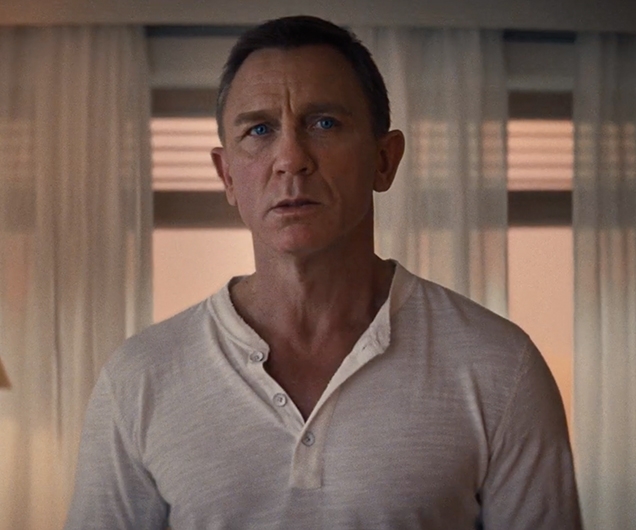 Daniel Craig as James Bond wearing a Rag & Bone Henley shirt in No Time To Die