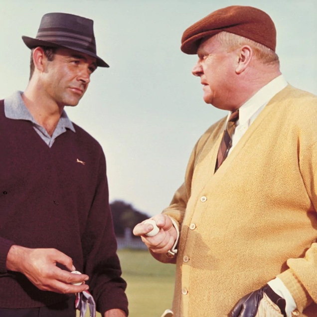 James Bond and Auric Goldfinger during the golf match in Goldfinger.