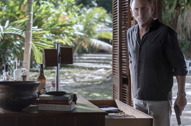James Bond in his Jamaican home, with a bottle of Blackwell Run on the table.