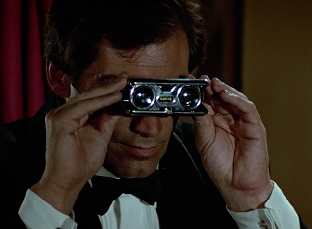 Timothy Dalton as James Bond uses Tasco Folding Opera Binoculars in The Living Daylights. He holds them upside down.
