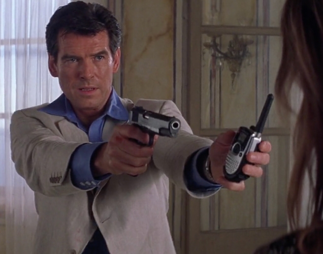 Pierce Brosnan as James Bond hands the Motorola TalkAbout TA280 SLK Two-Way Radio to Elektra King (Sophie Marceau)