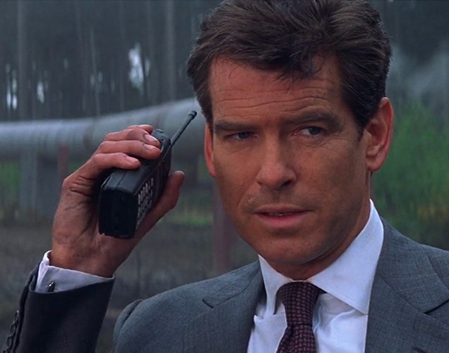 Pierce Brosnan as James Bond uses a Motorola Professional Series two-way radio in The World Is Not Enough