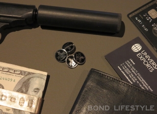 A pair of the Tom Ford cufflinks displayed among other accessories from Craig-era movies at the Bond In Motion exhibition in the London Film Museum