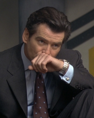 Pierce Brosnan as James Bond wears Dunhill cufflinks in Tomorrow Never Dies.