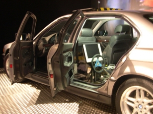Modified BMW 7 series with steering wheel on the back seat, seen at an exhibition at Museum Industriekultur, Nuremberg