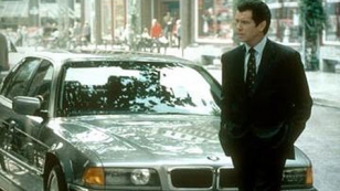 Pierce Brosnan as Bond in Tomorrow Never Dies with the BMW 750iL