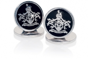 Tom Ford cufflinks featuring Bond's family coat-of-arms with the motto "Orbis Non Sufficit" (The World Is Not Enough)