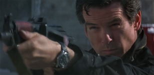 In the pre-title sequence, which is set 9 years before the rest of the film, it looks like Bond wears a Seamaster on a black strap.