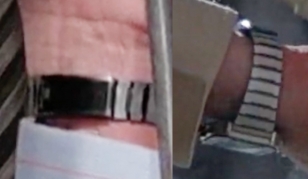 A good look at the bracelet. The clasp seems to be covered with black tape or black paint.