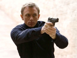 In Quantum of Solace, James Bond uses P226 handgun that he took off of a MI6 agent while escaping his arrest in Bolivia. 