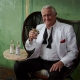 George Lazenby in ad for The Melbourne Gin Company and new audiobook Passport to Oblivion