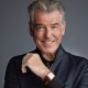 Pierce Brosnan Tom Ford jacket and watch in Historys Greatest Heists